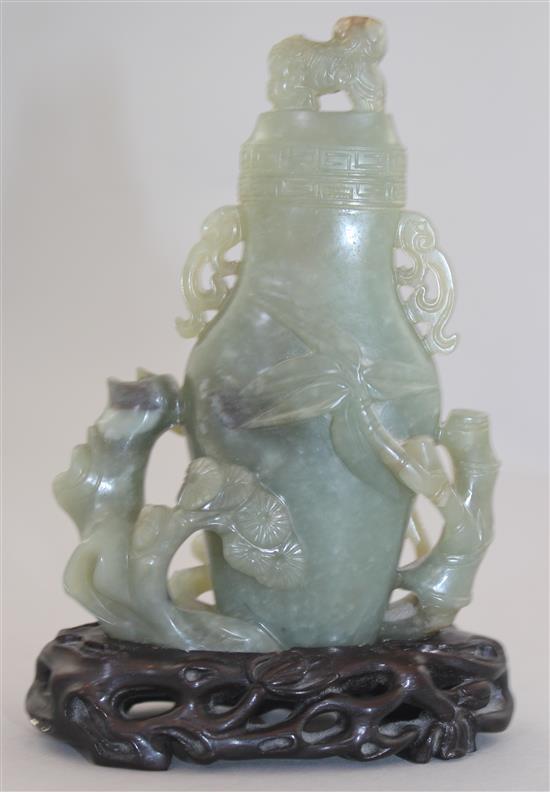 A Chinese celadon jade vase and cover, late 19th / early 20th century,